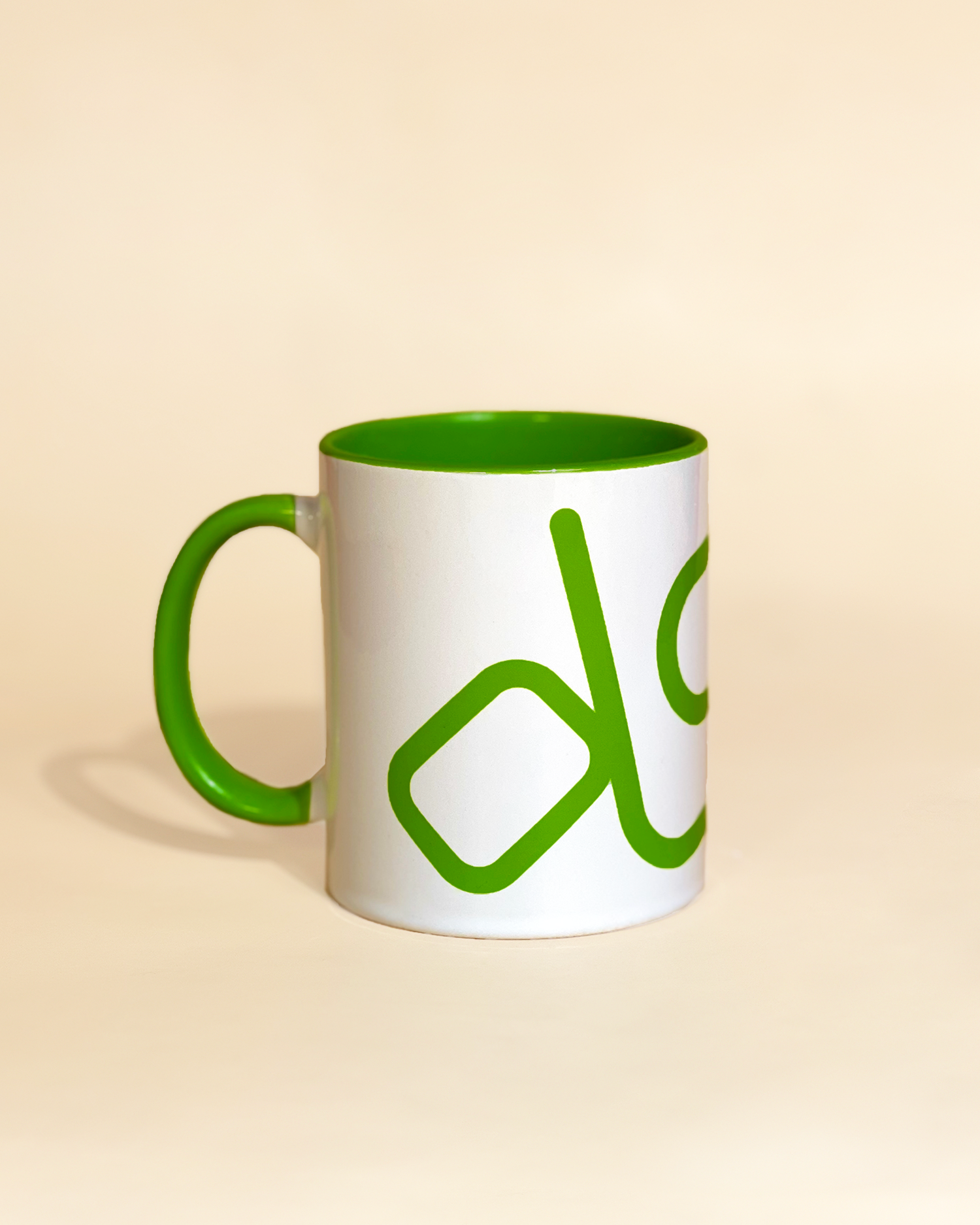 Stylist elegant olaben mug with green olaben logo in white background outside and green background inside