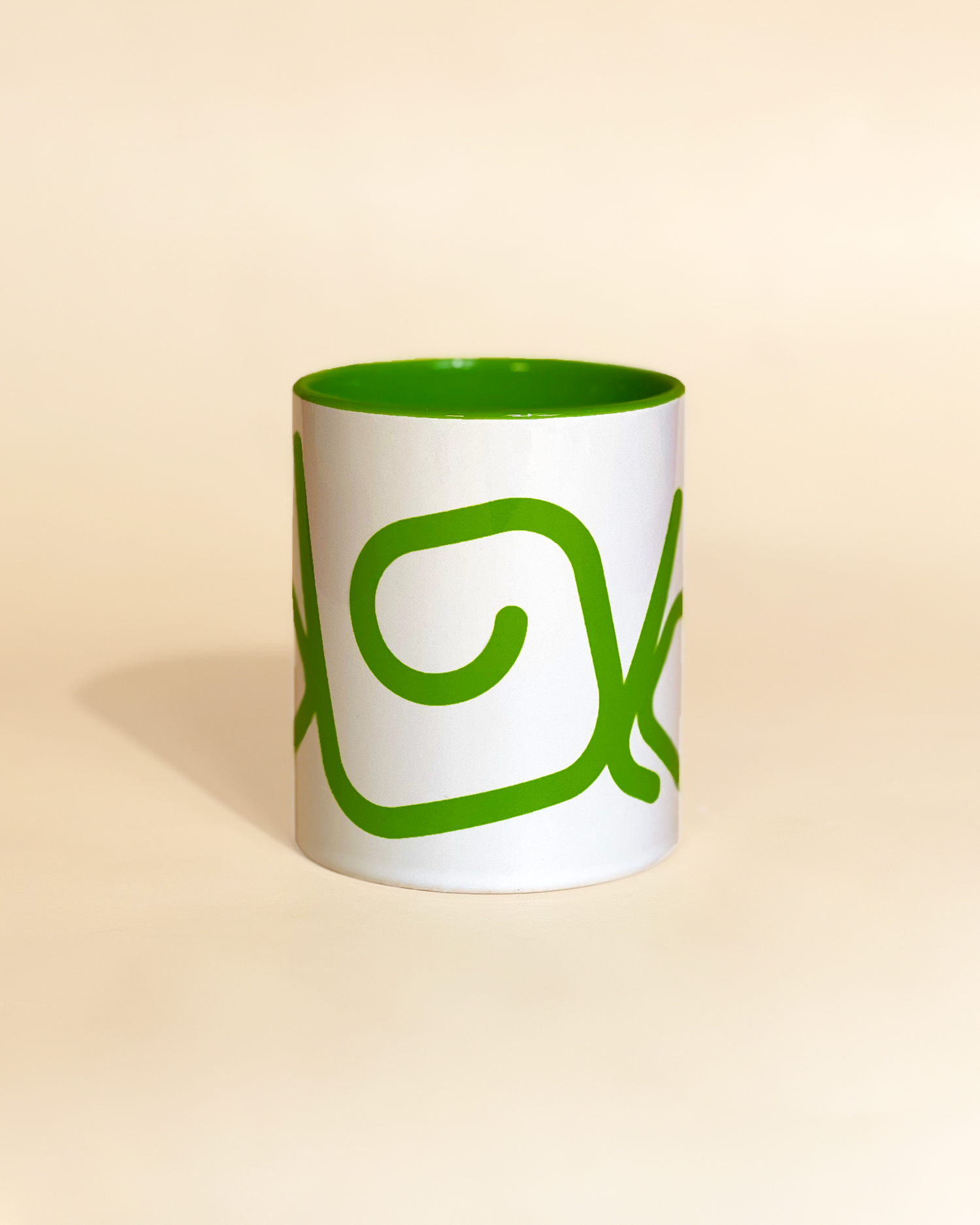 Stylist elegant olaben mug with green olaben logo in white background outside and green background inside