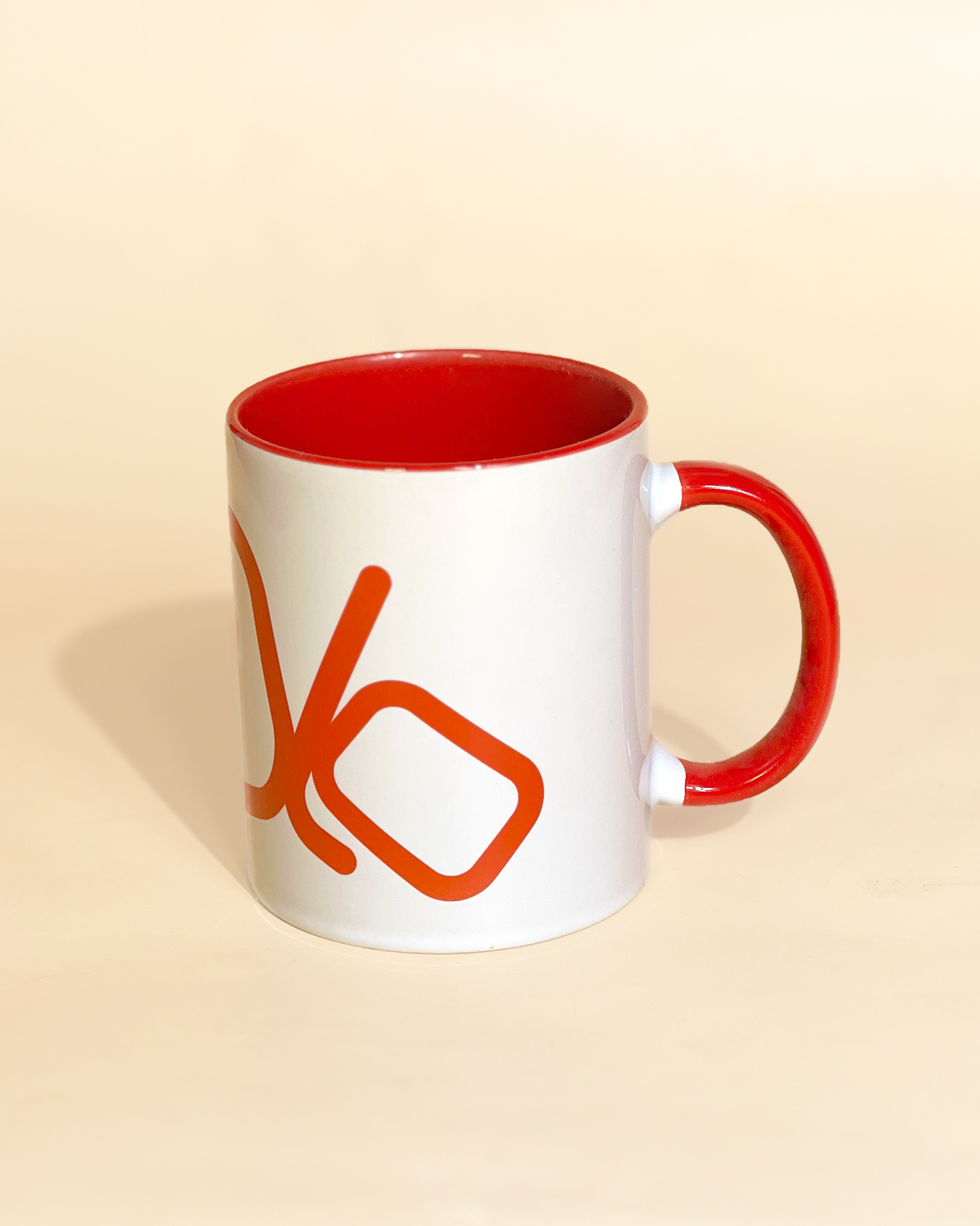 Stylist elegant olaben mug with red olaben logo in white background outside and red background inside