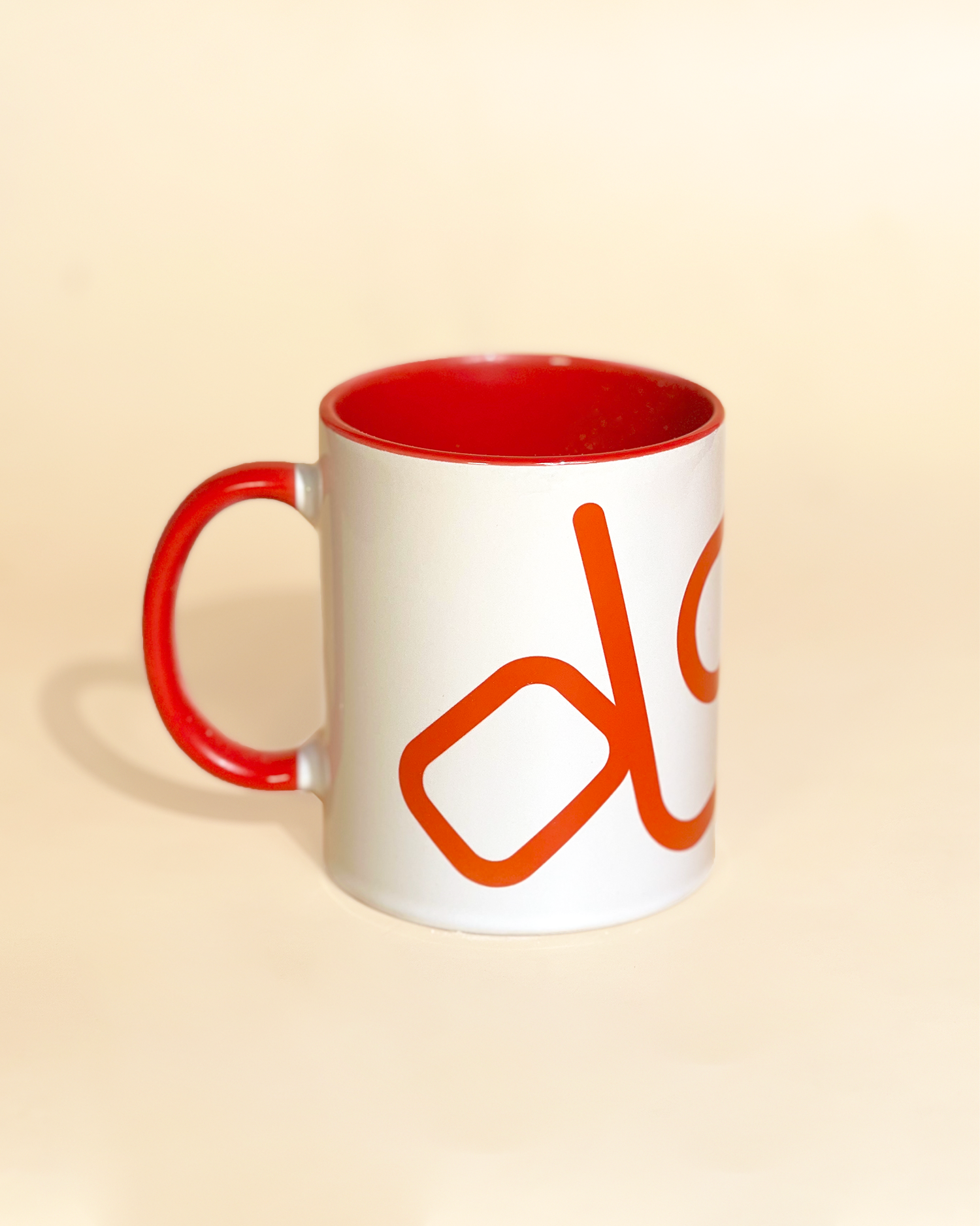 Stylist elegant olaben mug with red olaben logo in white background outside and red background inside