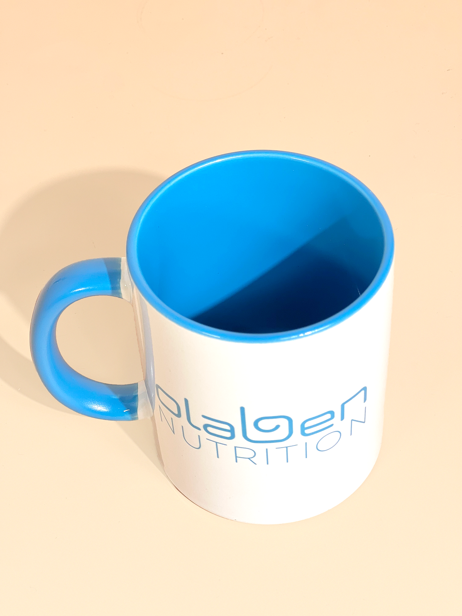 Stylist signature olaben cup in blue and white background